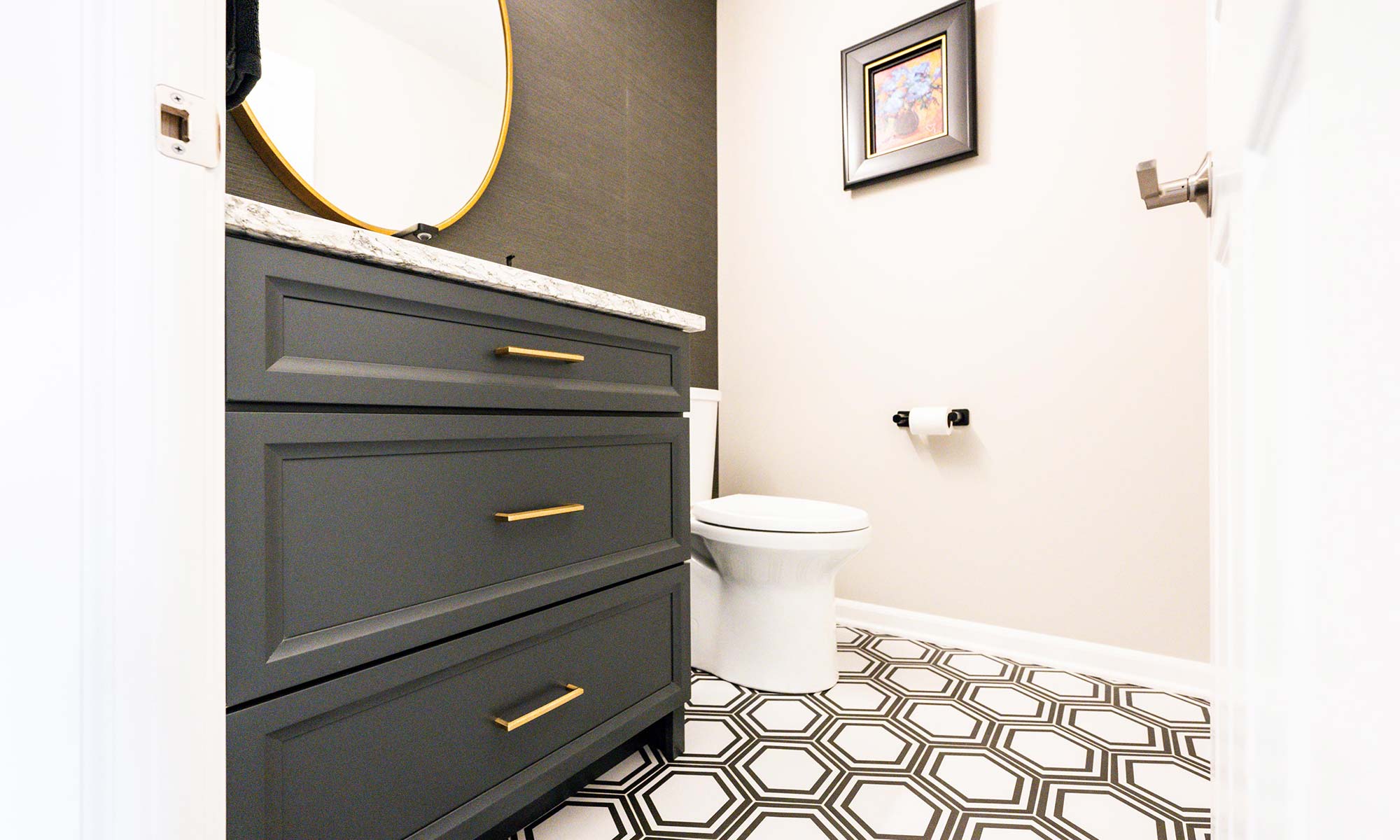 A bathroom with a furniture vanity and toilet