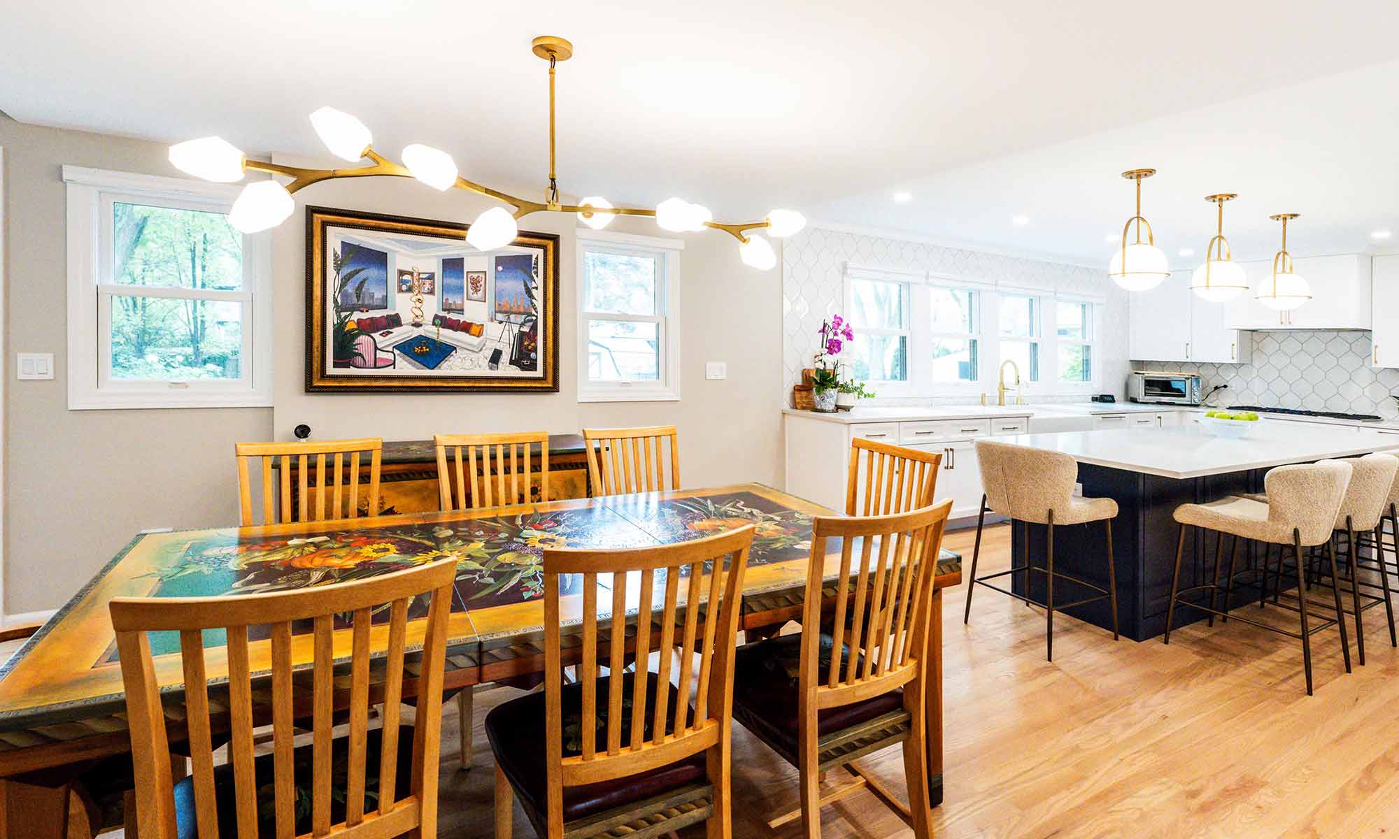 A dining room with a table and chairs