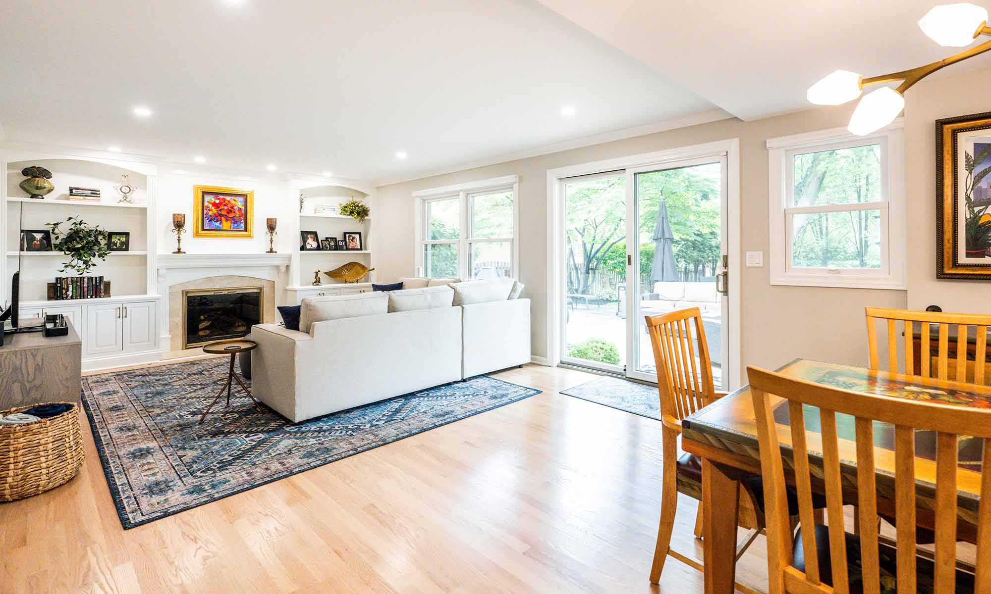 A living room with a fireplace and a couch