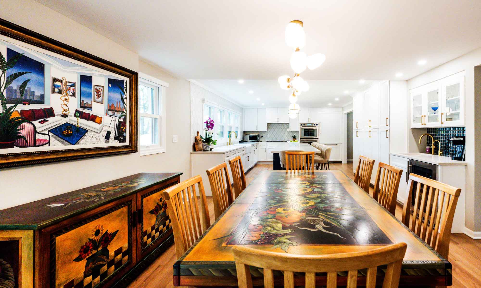 A dining room with a table and chairs