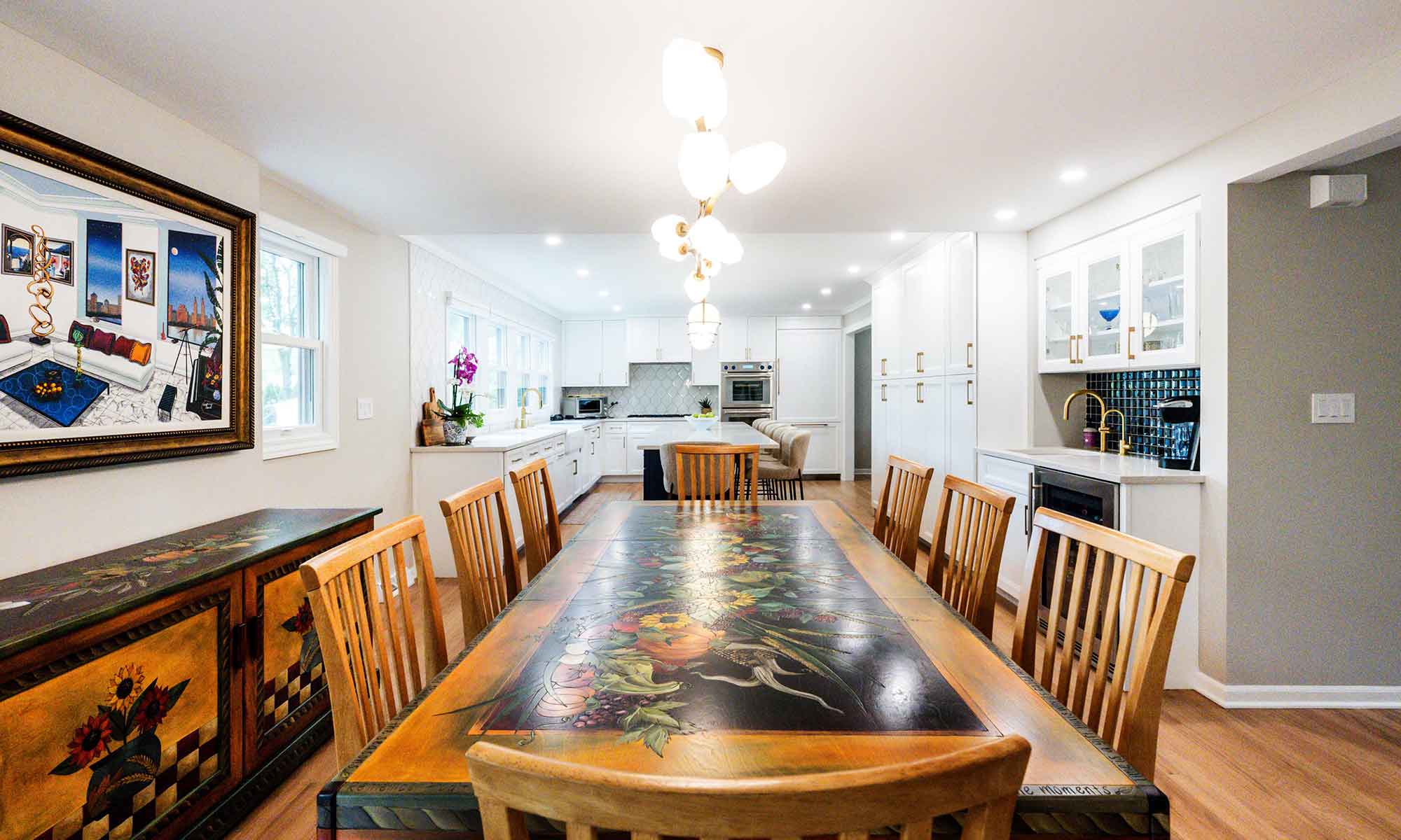 A dining room with a table and chairs