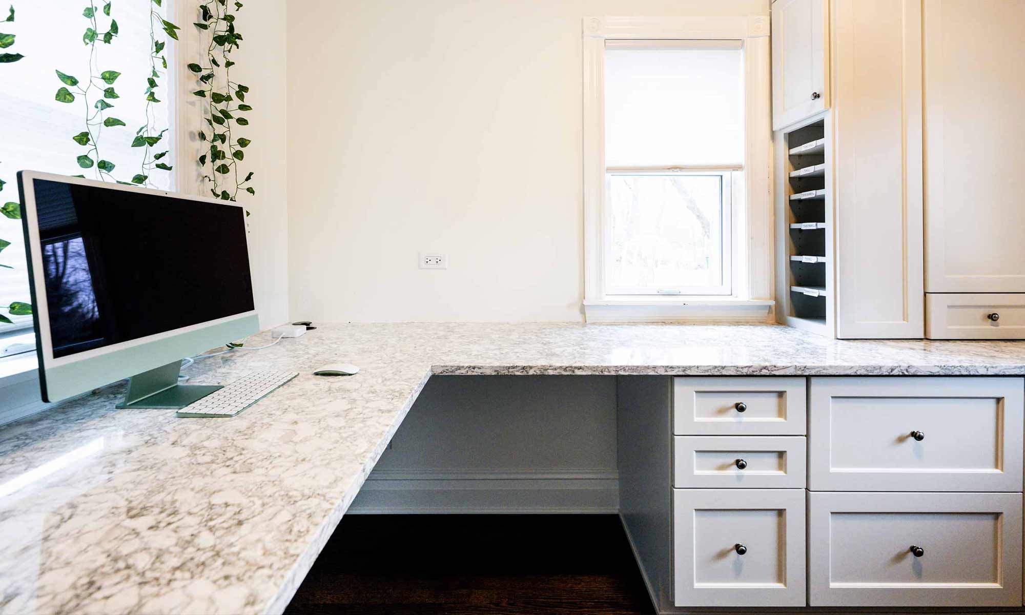 white built-in office cabinetry with file storage
