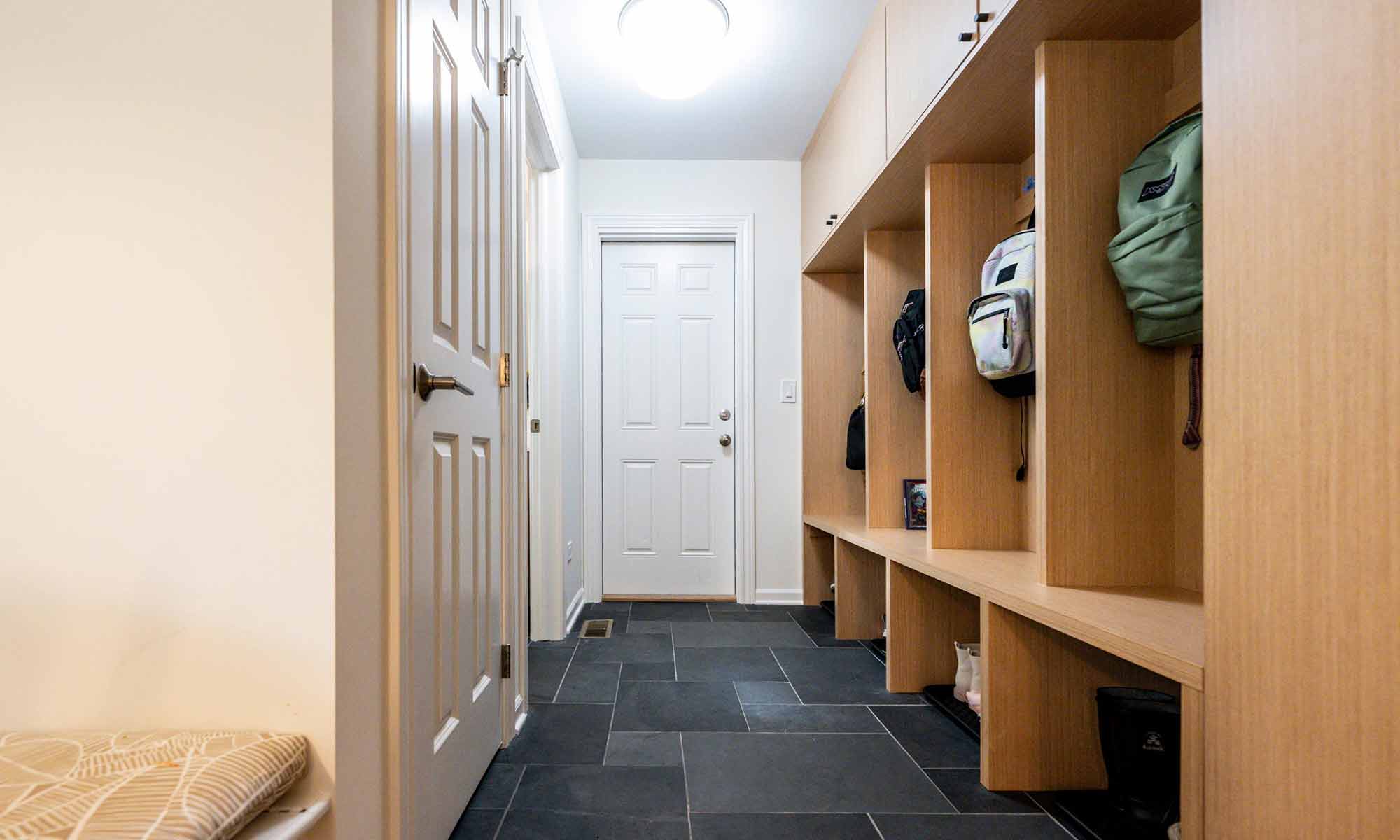 white oak mudroom built-ins in luxury home remodel