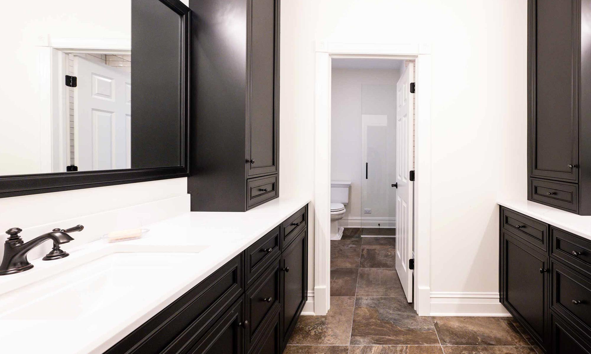 luxury bathroom remodel with tall medicine cabinetry