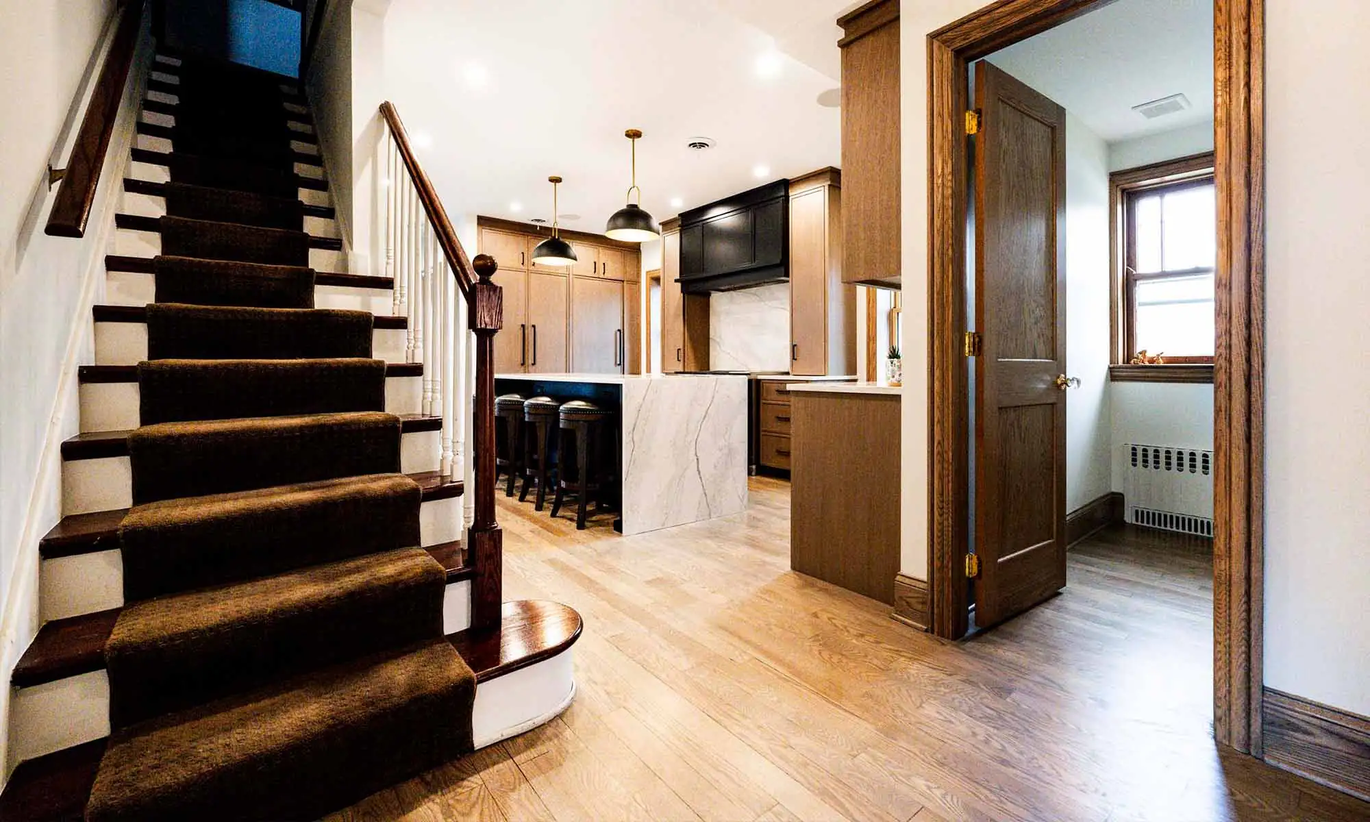 luxury kitchen remodel looking towards staircase
