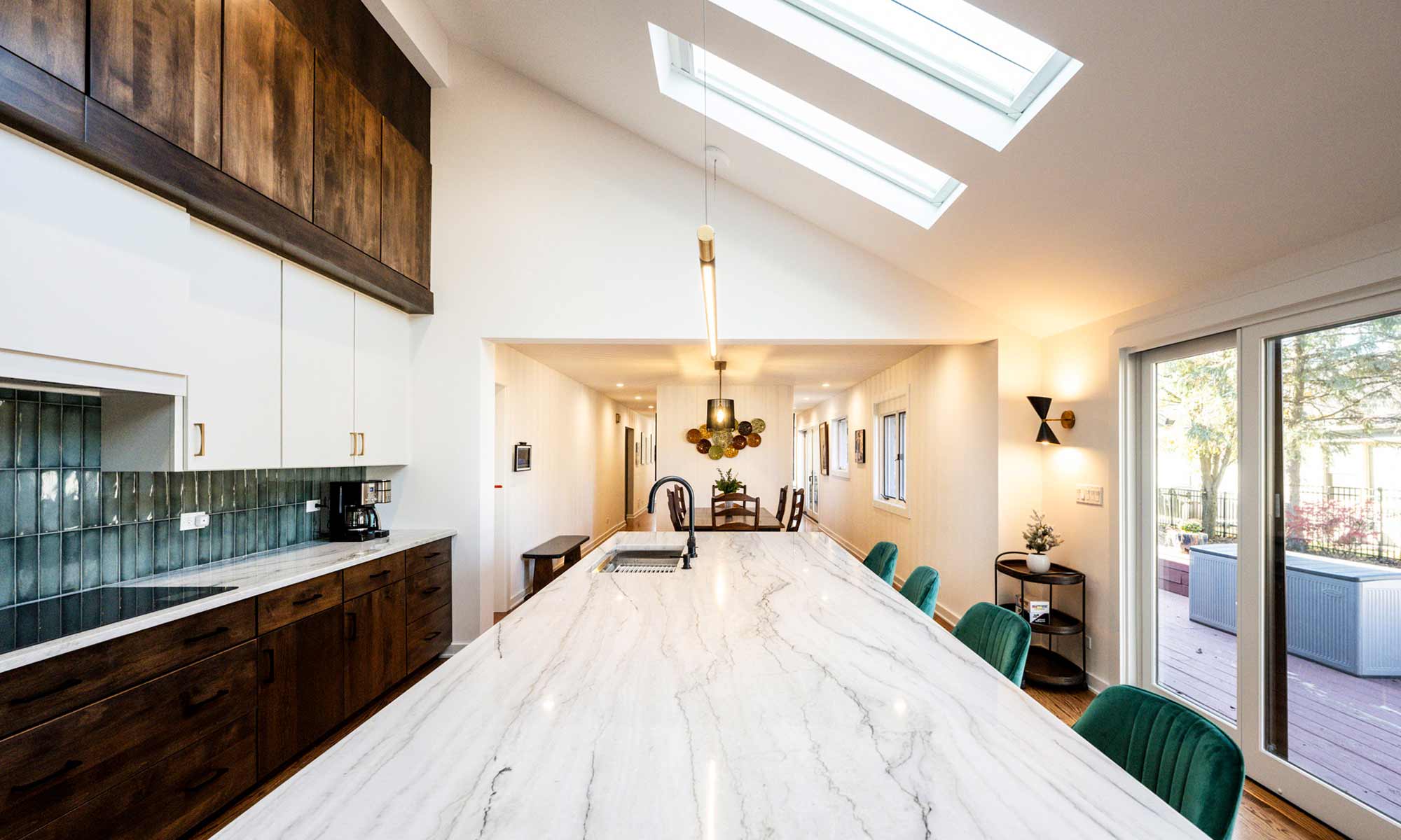 A bright kitchen featuring a skylight that illuminates the space with natural light.